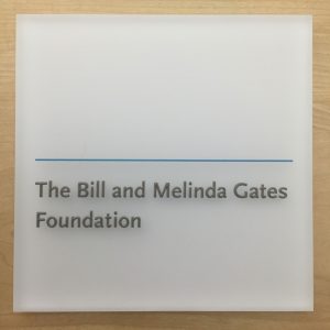 Architectural signage: Raised text, first surface print